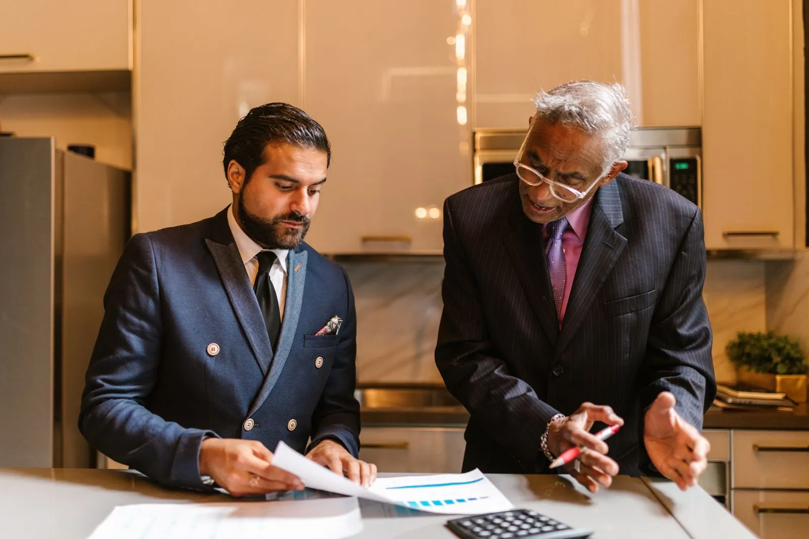 Diverse business team collaborating on a whiteboard across regulated verticals