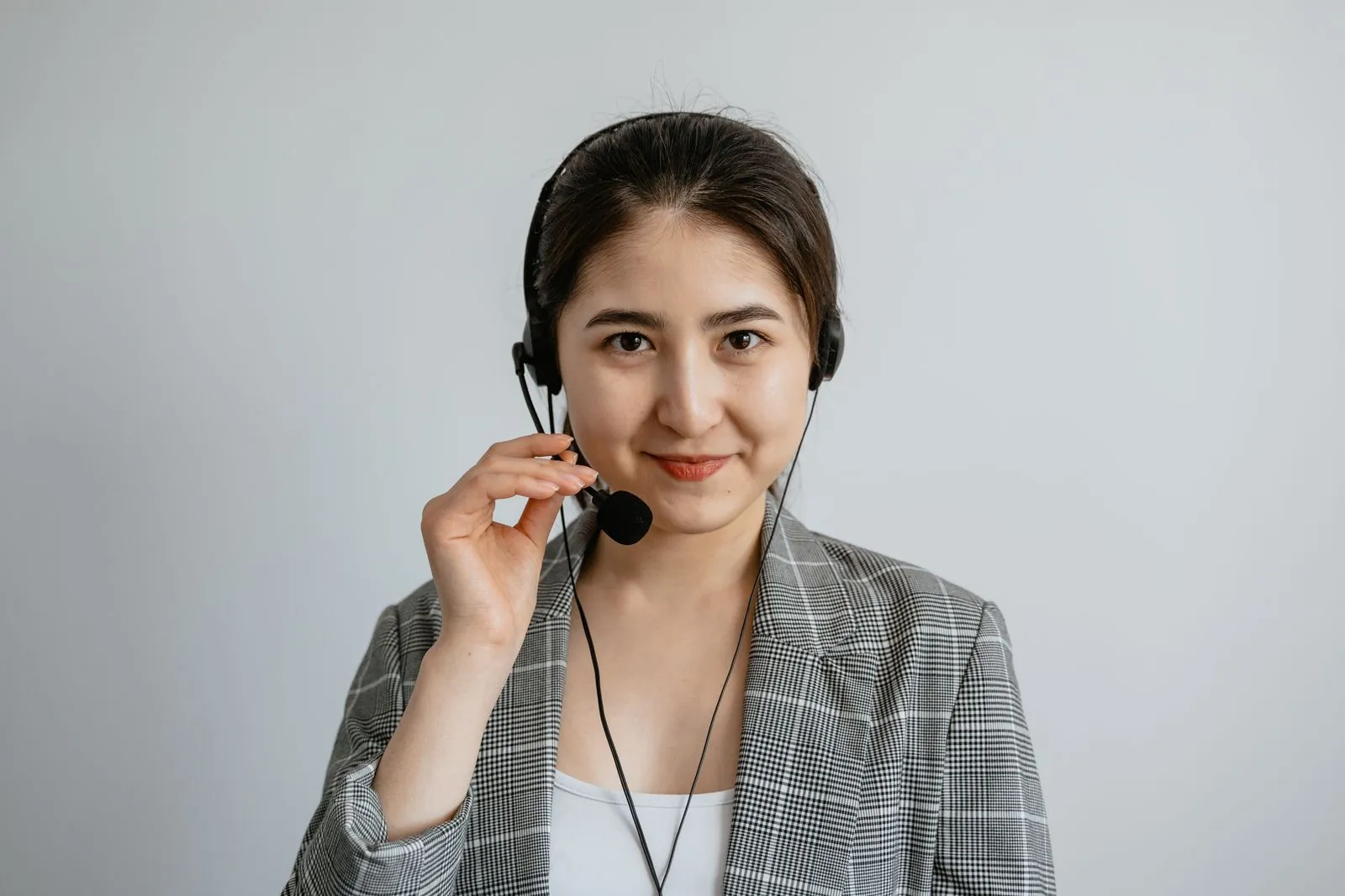 IVR flow designed on a laptop with a customer-support headset nearby