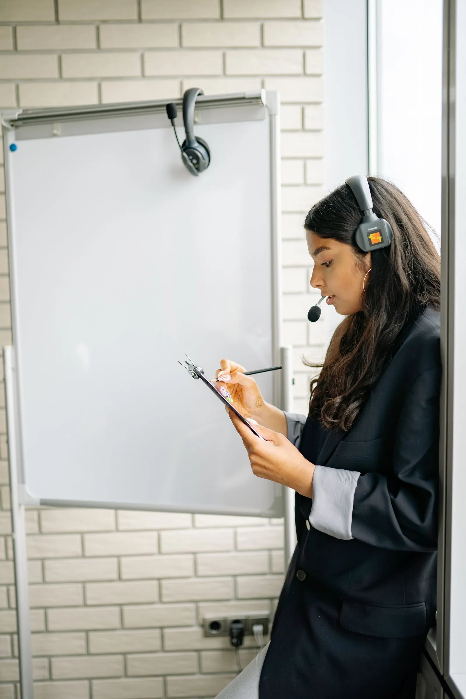 Supervisor coaching a contact-center agent in a training session